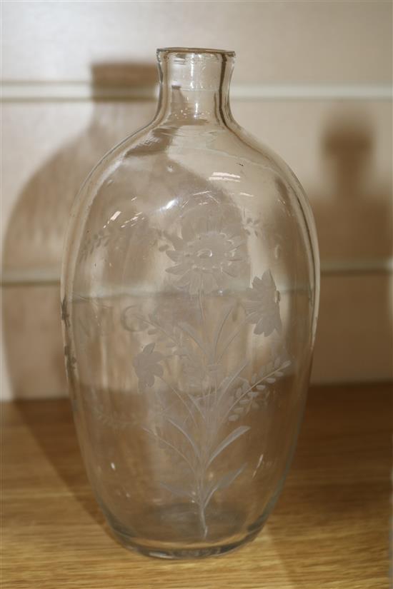 Four 18th/19th century etched glass flasks, one with silver mounted stopper tallest 19.5cm